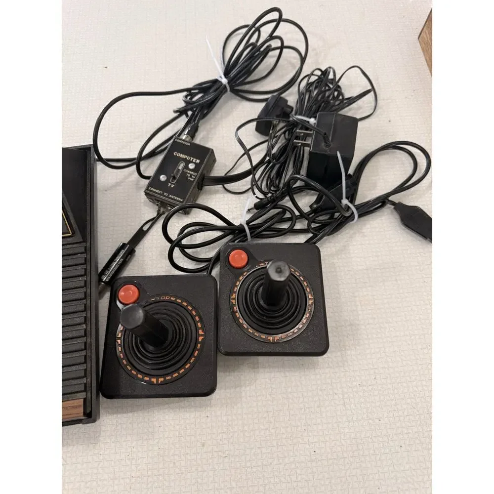 Atari 2600 Black Video Game Console Bundle with Pac-Man Game